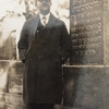 Photo credit: Andrew Seidenberg.
Hirsh Kalmanovich is standing at the grave of his father Avraham.